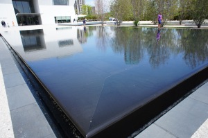 Aga Kahn Museum reflecting pools arranged around a center pool.